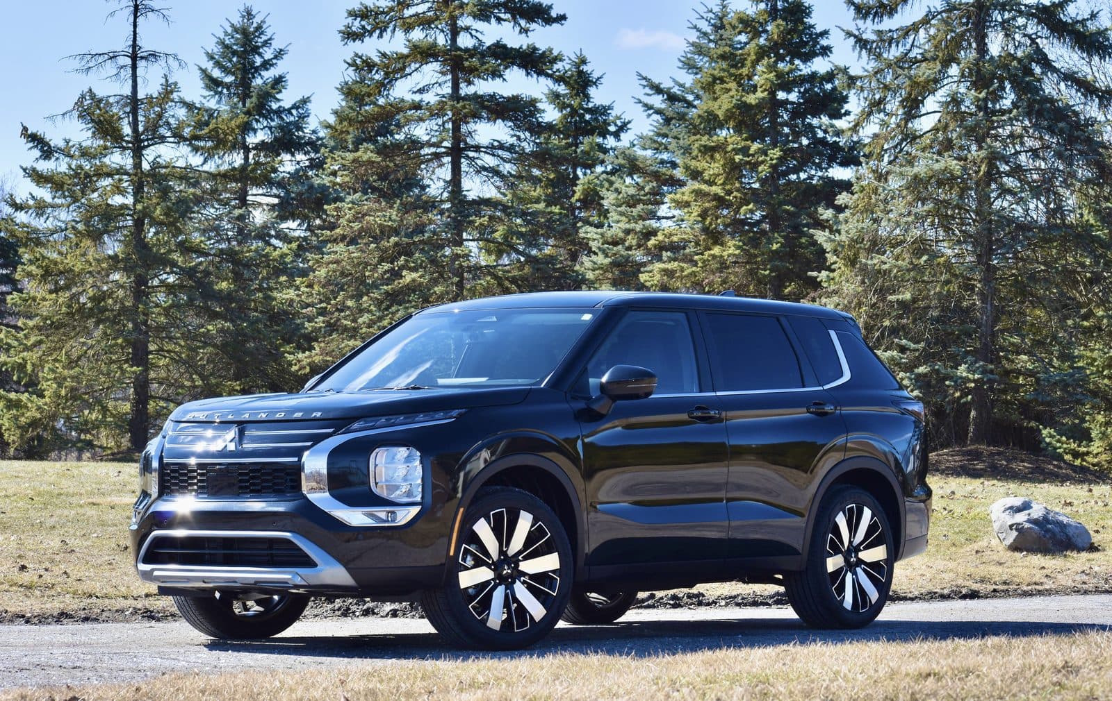 Black Mitsubishi Outlander three-row SUV from the FAJ Rentals fleet, Detroit